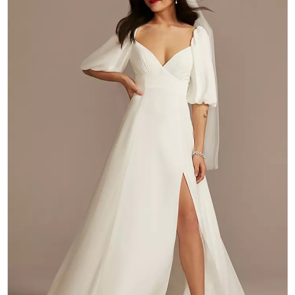 DB STUDIO
Bubble Sleeve Georgette V-Neck Wedding Dress
STYLE# SDWG0971. Size 16w - Picture 10 of 16